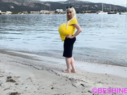 Be$hine and her huge tits walking at the beach