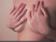 Helenmoors oiling up her boobs with nip lips