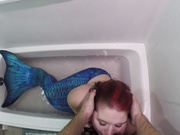 Mermaid blowjob in bathtub