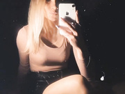 Sexy Polish girl in miniskirt and shiny nude pantyhose