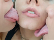 Two Redheads Licking Face of a Blue-haired Girl