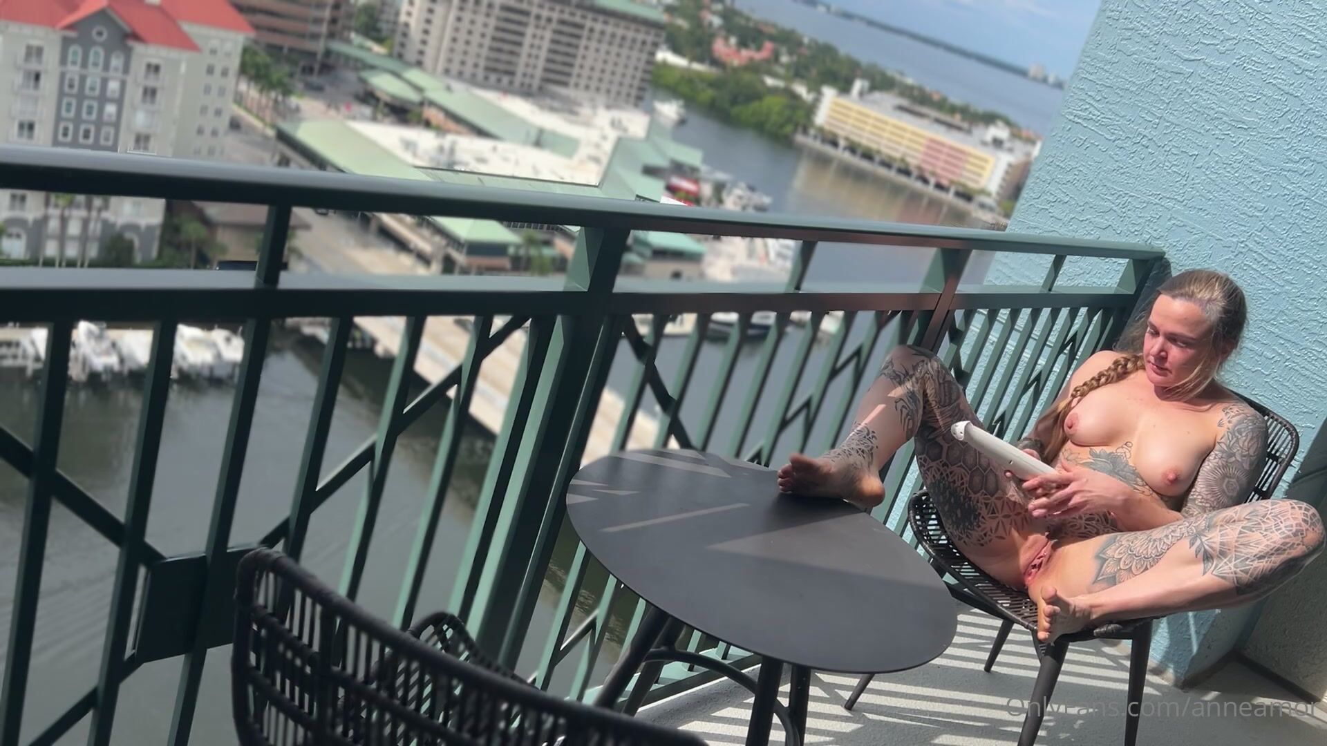 Anneamor masturbates on balcony