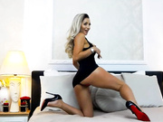 Andrea Alenna in black dress no panties