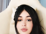 Brunette teasing with a dildo