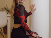 Saraholde in sexy shorts and shiny black pantyhose