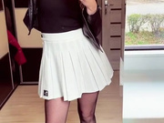 Sexy Polish blonde in miniskirt and fishnet pantyhose