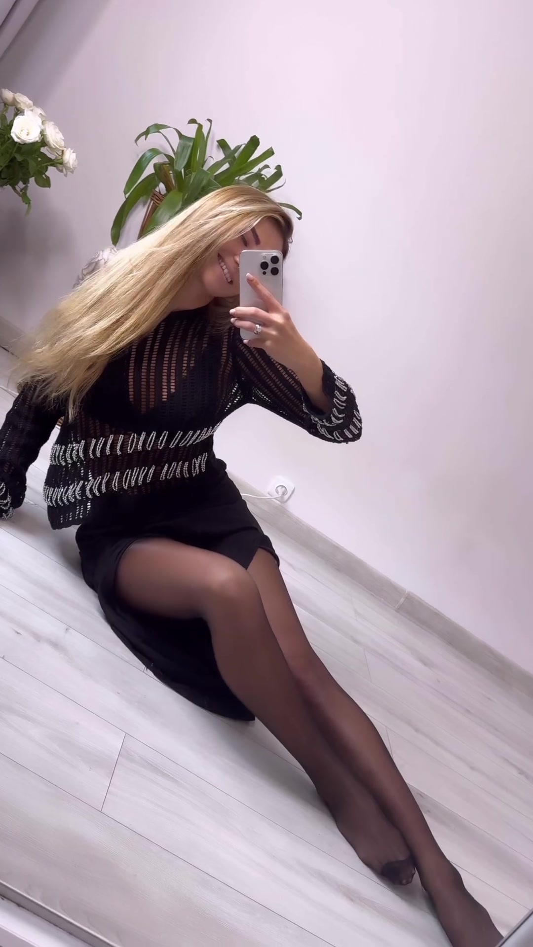 Sexy Polish blonde shows her legs in shiny pantyhose 2