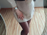 Sexy Polish blonde in dress and shiny black pantyhose