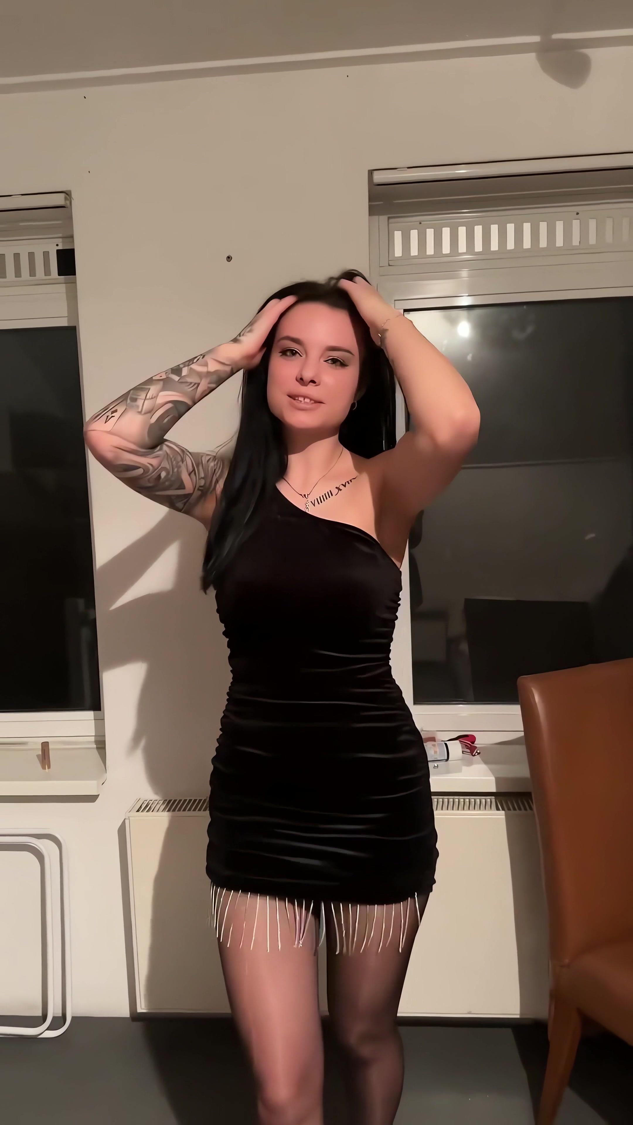 Sexy Polish slut shows her legs in shiny black nylons