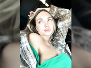 AngelinaMoore plays in car on busy road