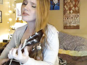 Freckles playing guitar