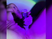 Dildo ride in neon lights