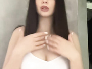 Sexy young Polish slut shows her big tits in white top