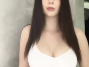 Sexy young Polish slut shows her big tits in white top