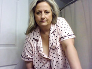 ElizabethBarns show a quick flash of her DDD tits