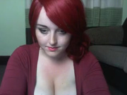 Busty Redhead Plays Around