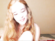 Pretty redhead, with small tits.