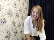 Beautiful redhead with hot body teases and masturbates