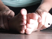Stephie sucks her own dirty toes