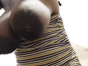 Cherry Cuchy giving milk from her huge melons