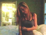 Busty blonde strip on the phone