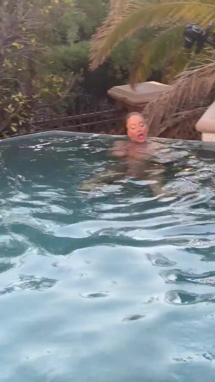 Nicolette Shea topless pool