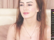 Megany sucks on a dildo