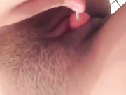 Girl licking lollipop